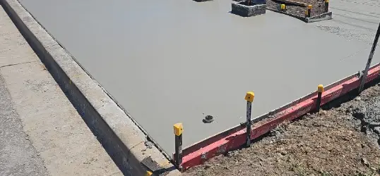 Formwork and reinforced concrete footing preparation for a bus shelter installation in Brookvale
