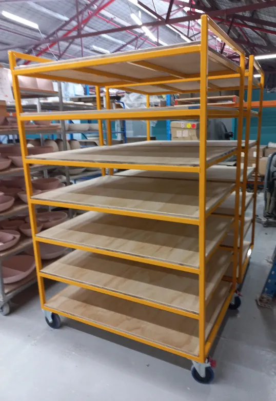 Heavy-duty distribution trolleys with timber shelves used in a warehouse in Sydney