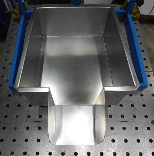 Precision sheet metal hopper with stepped chute discharge for food manufacturing in Sydney