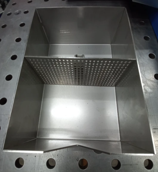 Precision laser-cut sheet metal components with tight tolerance edges